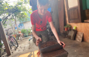 Making chocolate in Belize with kids
