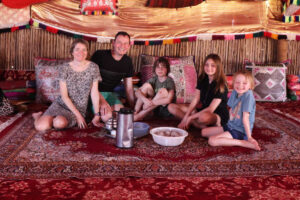 Family in traditional Omani tent