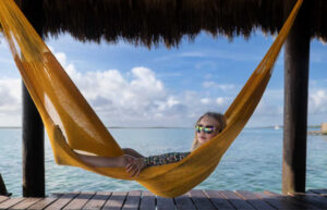 Girl in hammock at Bacalar Lagoon, Mexico, Yucatan Peninsula