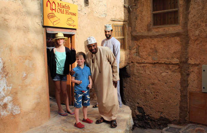Family arriving at Misfah Old House, Oman holidays with kids