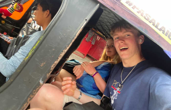 Travel by mototaxis (also called tuk tuk) in Guatemala, on a Guatemala family holiday