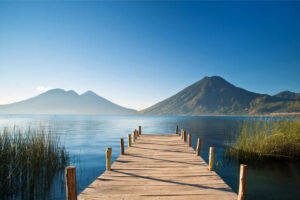 Lake Atitlan flanked by volcanoes, Guatemala family holidays, Guatemala itineraries and when to go.