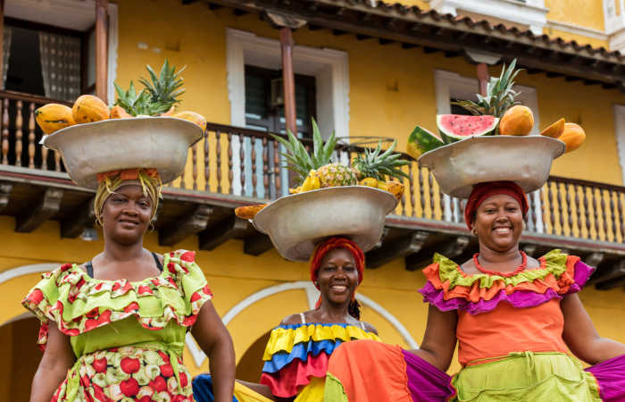 Palenqueras selling fruit in Cartagena, Colombia, Easter family holidays