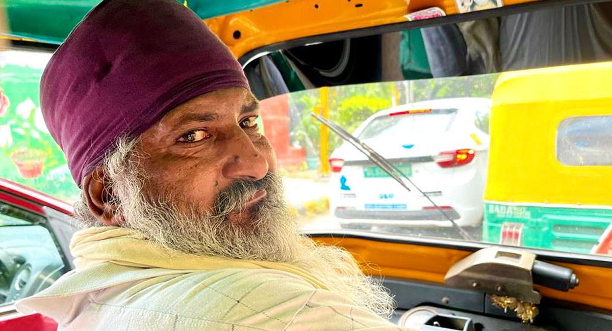 Photo of a tuk-tuk driver in India