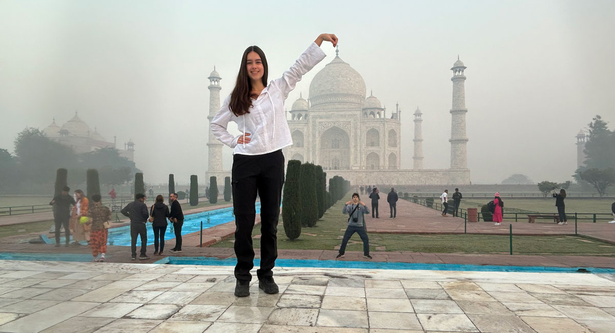 Teenager posing at the Taj Mahal