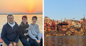 Varanasi, India - family on a boat trip at sunset with ghats in background