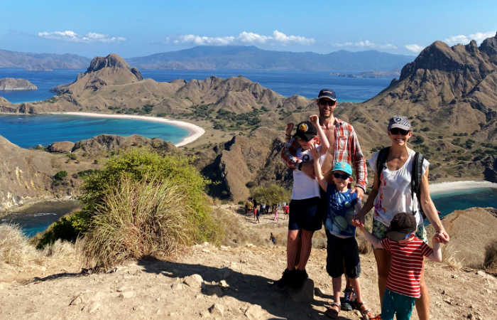 Bali & Indonesia best family holiday destinations abroad - family on Indonesian island with beach in the background