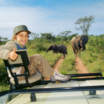 Family safari with elephants. South Africa with kids trip.