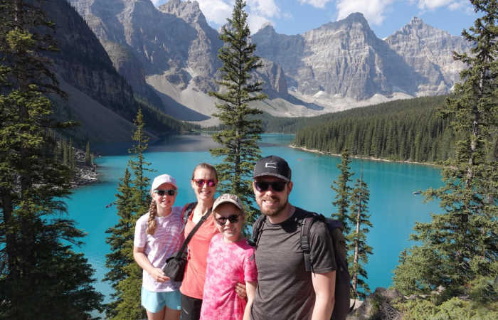 Parents and children in the Canadian Rockies on a family summer holiday