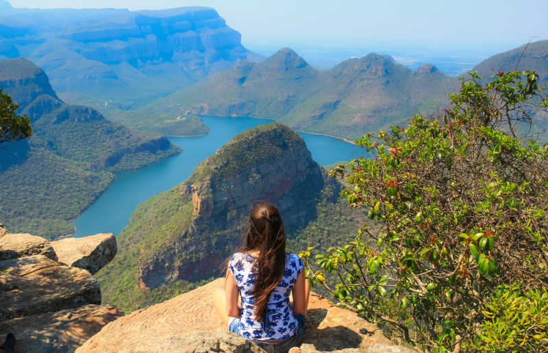 Blyde River Canyon, young woman looking at the spectacular vista
