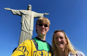 Mother and son below the Christ statue in Rio