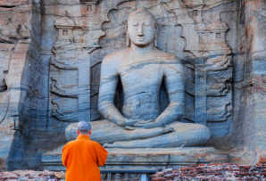 Buddha with monk at Polonnaruwa, Sri Lanka