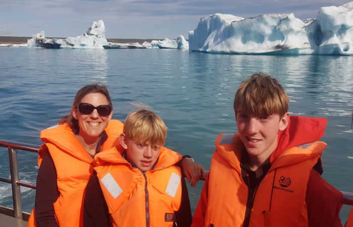 Family exploring the Jökulsárlón glacier lagoon