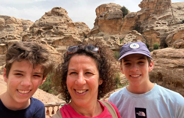Mother and sons explore the desert in Jordan, ideal for October half term holiday