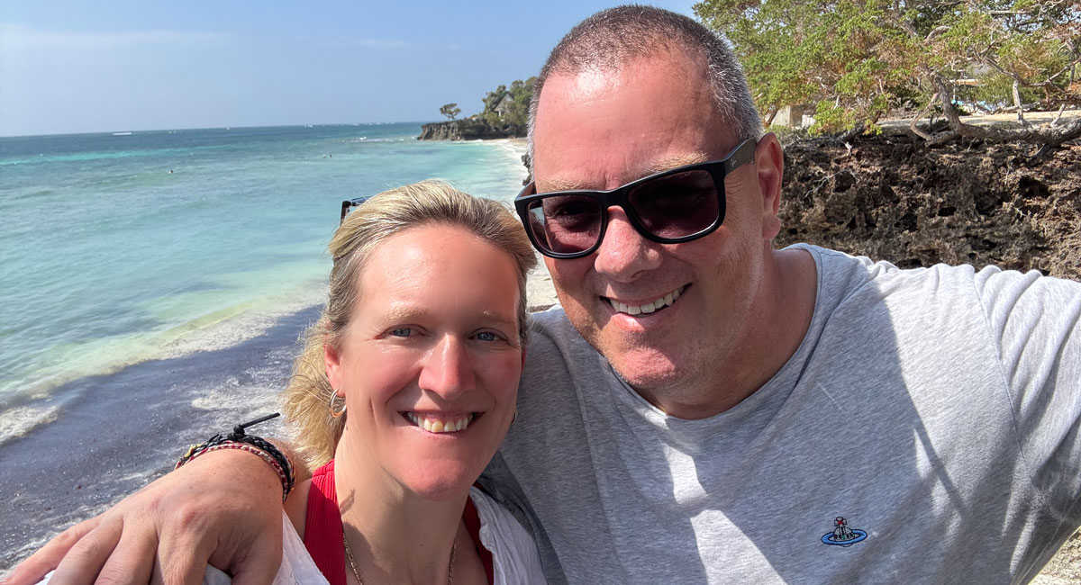 Couple celebrating 50th birthday by the beach in Kenya