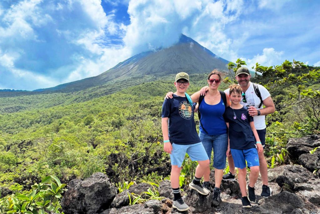 Family holiday Costa Rica, family in front of Arenal Volcano