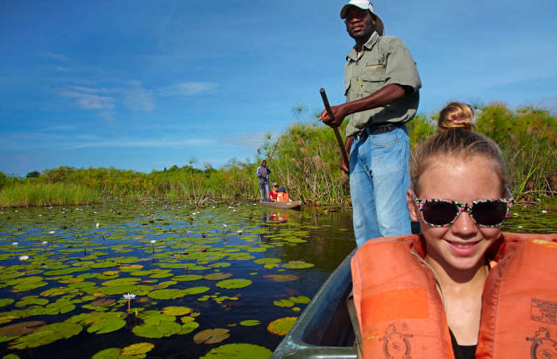 Exploring Botswana's Okavango Delta by mokoro (dug out canoe with punt)