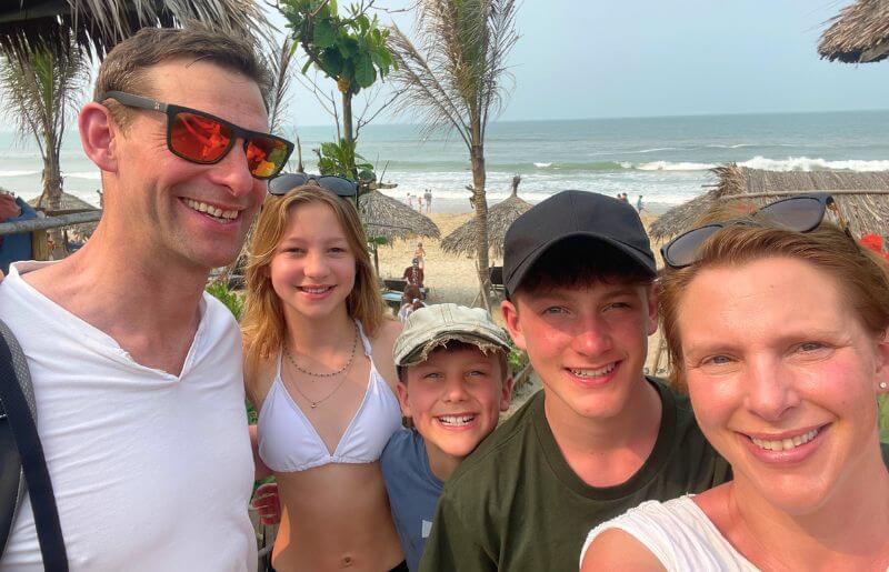 Family enjoying the beach in Vietnam whilst on holiday