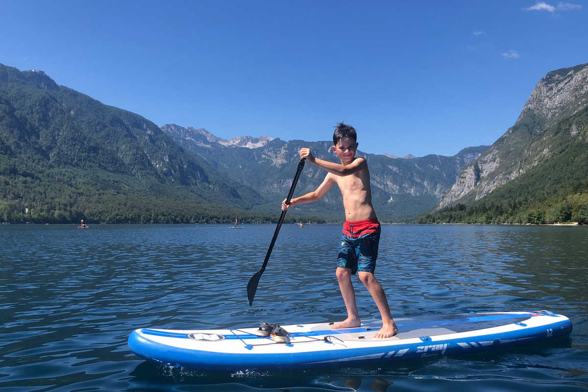 Family holiday in Europe, paddle boarding