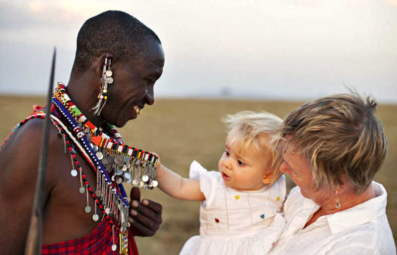Grandma with baby and Masai on Kenya multigenerational holiday