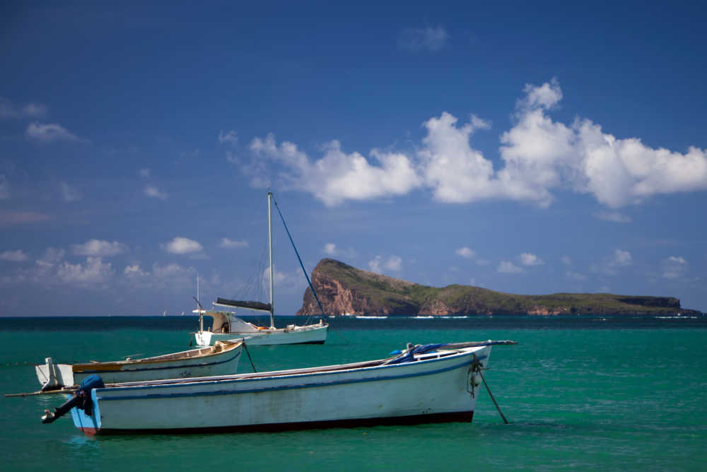 Boats with Coin de Mire in background, Mauritius Adventure family itinerary