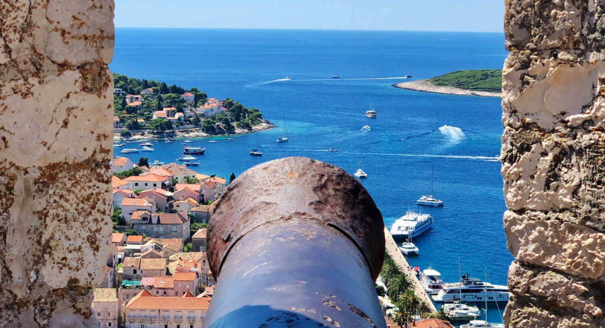 Hvar Island, Croatia, view of the old city taken from the castle, looking out to sea. Visit on an island hopping family itinerary