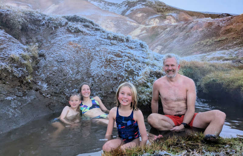 Family in thermal pools in Iceland on family adventure
