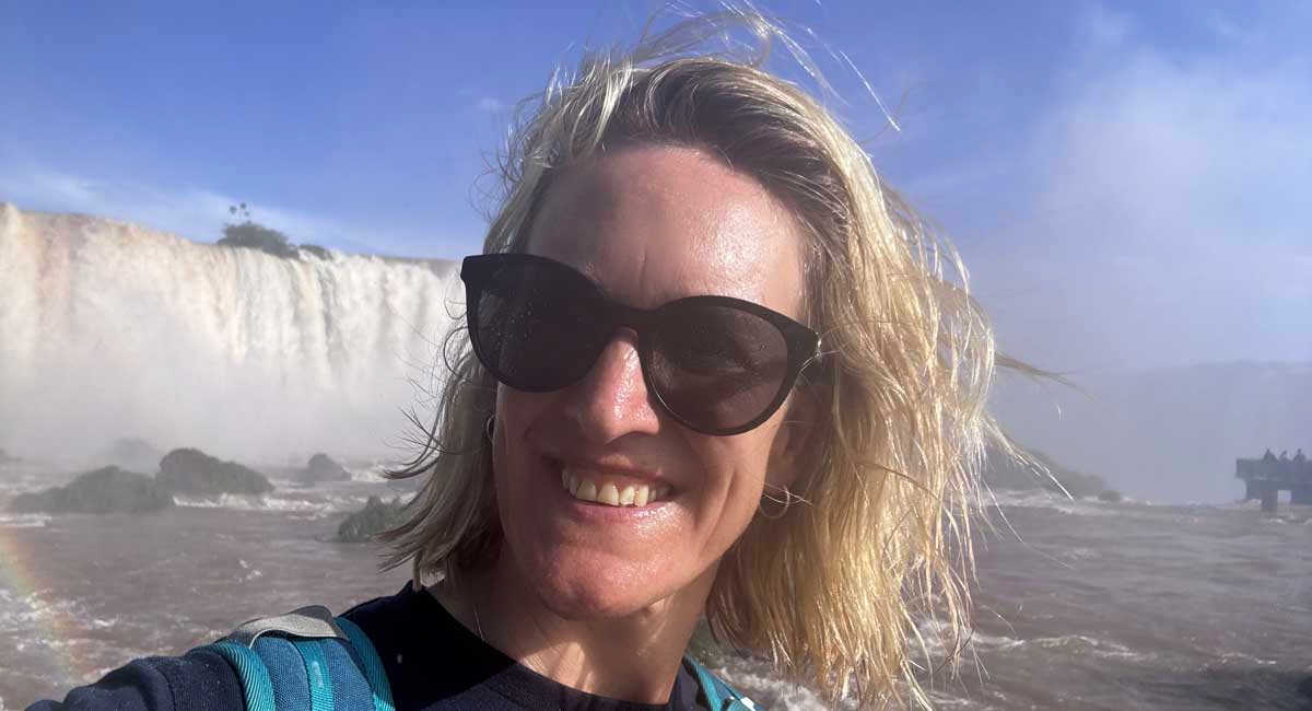 Family-friendly speed boat trip to the Iguazu Falls, mum with wet hair - everyone gets sprayed but it's fun!