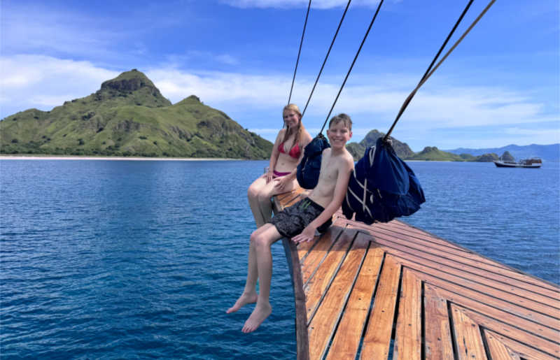 Two teenagers on a private luxury family boat trip in Indonesia, arranged as part of a tailor-made holiday, by Stubborn Mule Travel