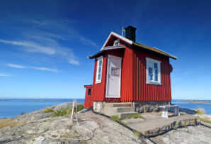 Gothenburg and Coast Sweden itinerary for families, traditional red hut on rocky island