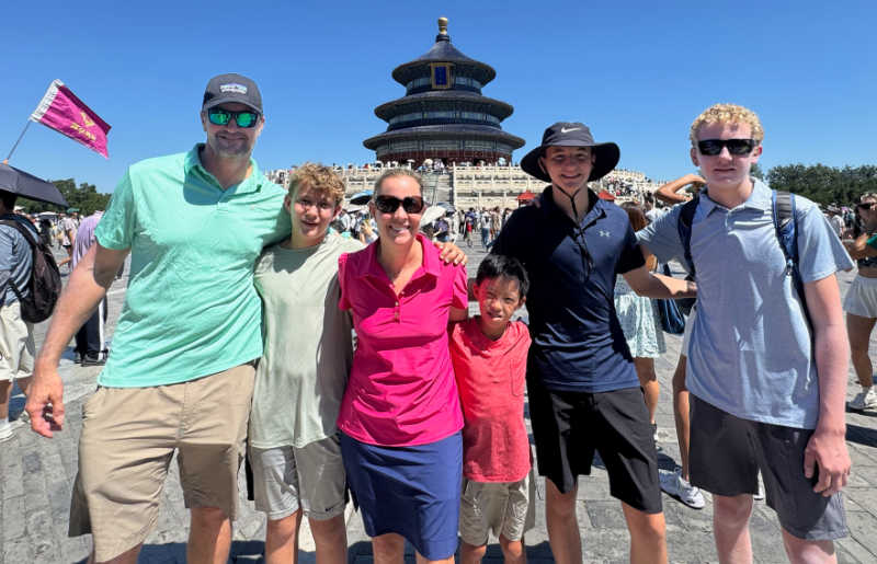 Family with teenagers visiting the Temple of Heaven, Beijing, on family trip to China