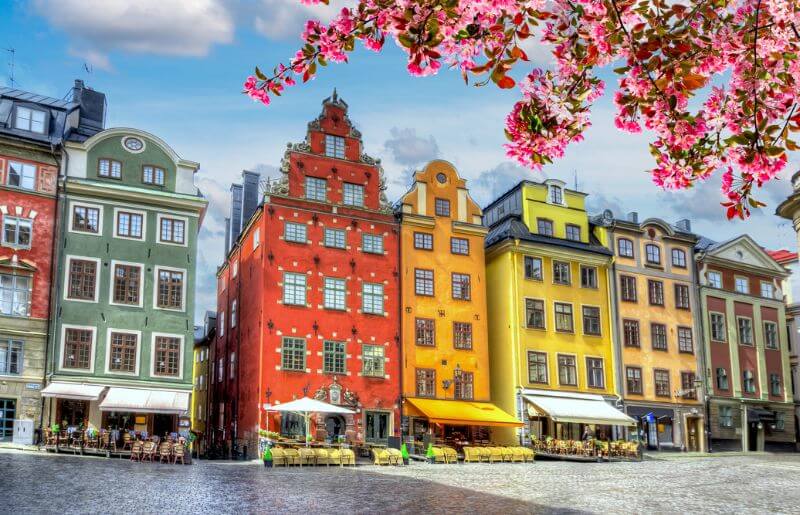 The colourful buildings of Gamla Stan in Stockholm - Swedish family holidays