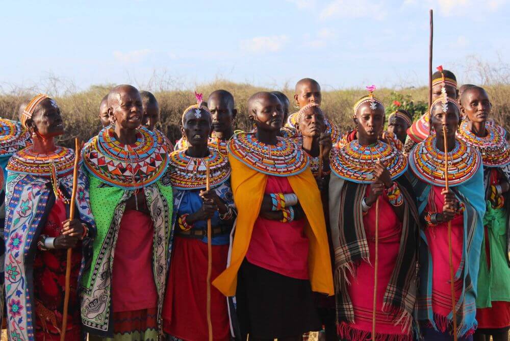 Kenya's Maasai welcome visitors, learn about with safari game drives