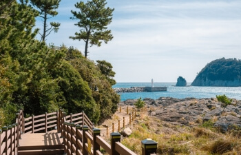 Seogwipo boardwalk to the coast on Jeju Island - family-friendly holidays in South Korea