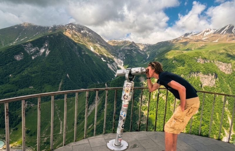 Teenager uses telescope on Georgia family holiday to look at the mountain views from the Russia-Georgia Friendship Monument