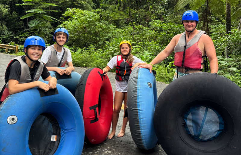 Family with teenagers and a pre-teen tubing in Costa Rica on a family holiday