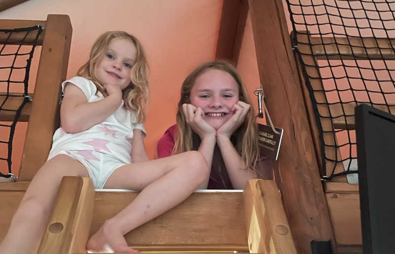 Family with children of different age groups on holiday in Slovenia, smiling and having fun.