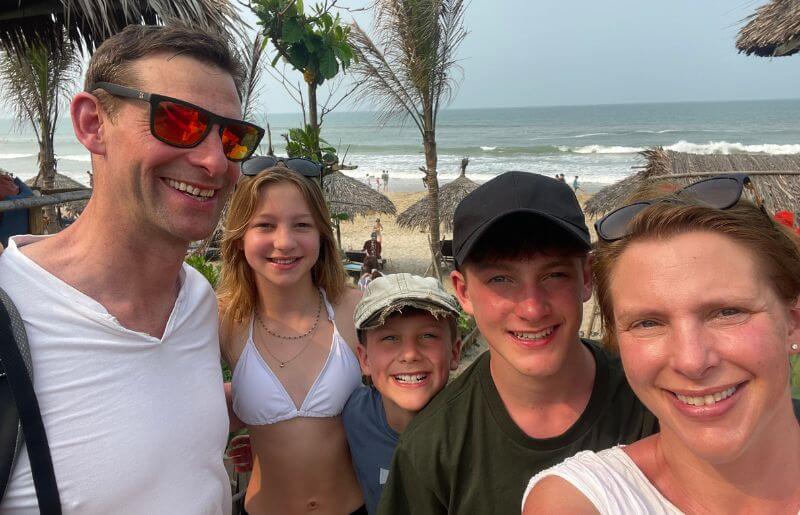 Family enjoying the beach in Vietnam whilst on holiday